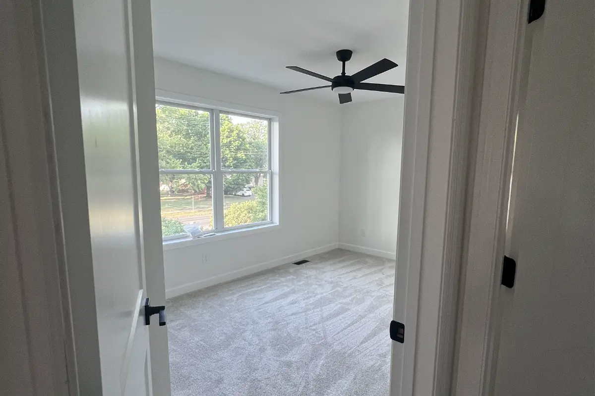 The Northstar 16 Upper level bedroom with ceiling fan