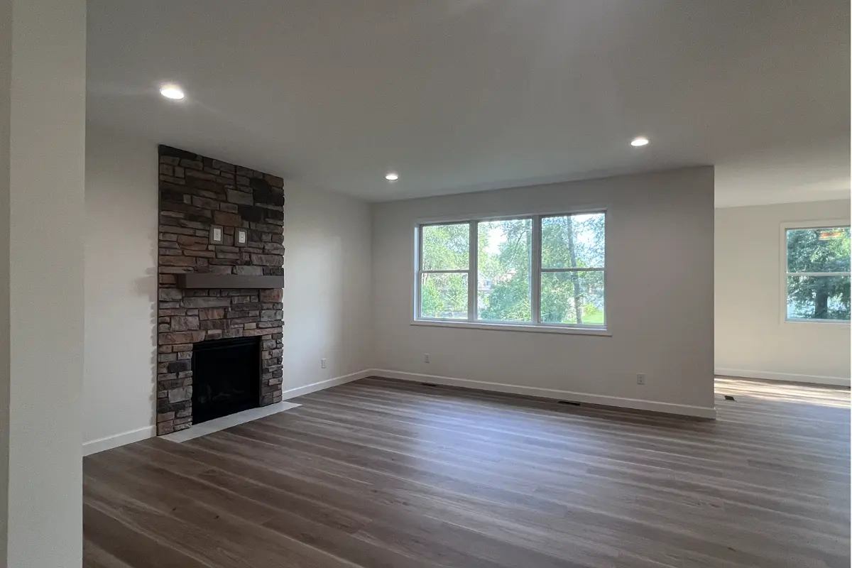 The Northstar 6 Living room with fireplace and power & Ethernet connection above fireplace